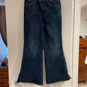 American Eagle dark wash flare jeans, with crazy stretch and cute little slit